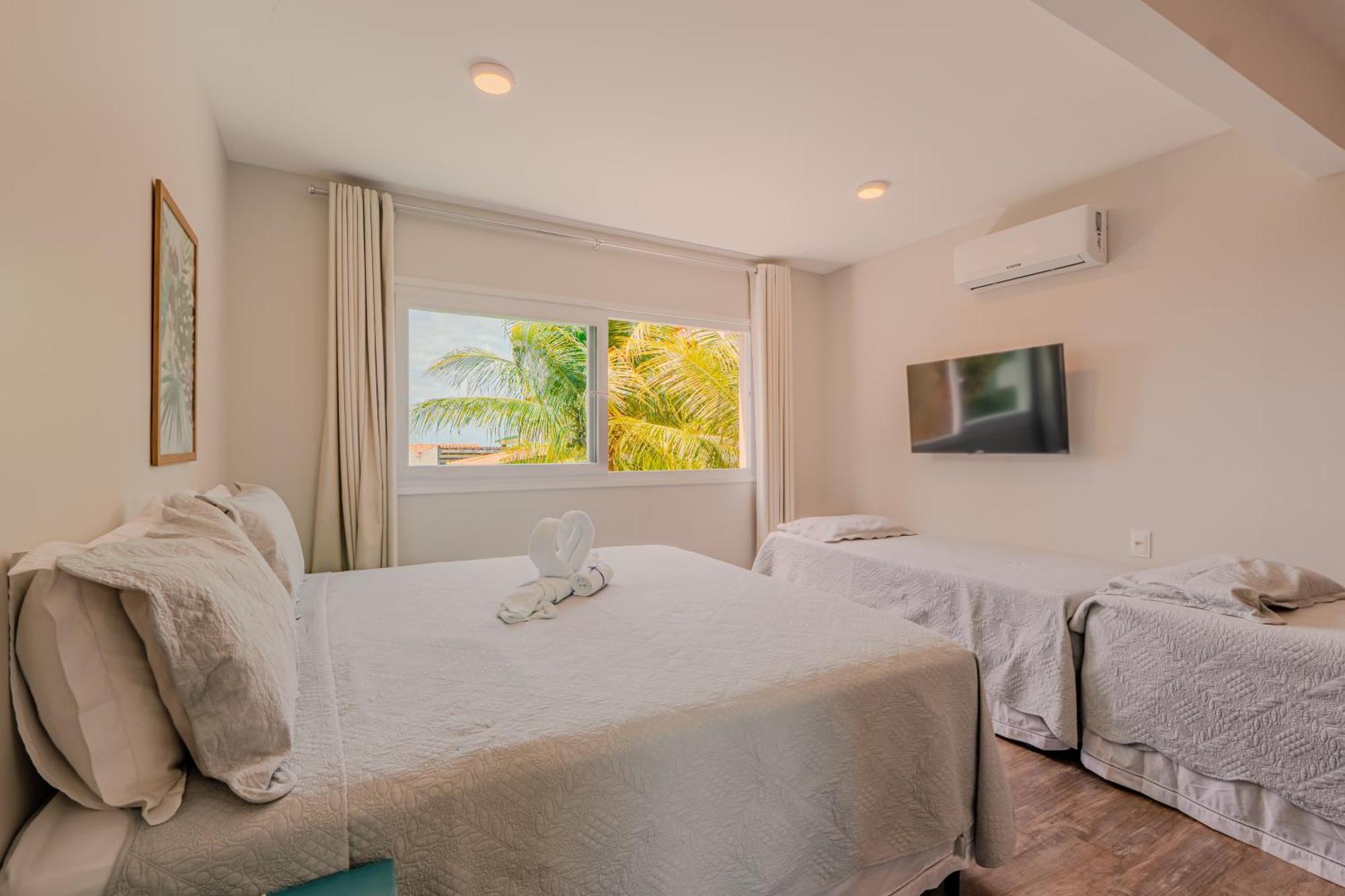 Quarto Duplo Deluxe com Vista Parcial do Mar